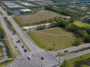 Aerial view of commercial parcels, road frontage, and access points near a major intersection in Miramar, Florida.