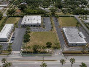Aerial view of shared driveways and private internal roads connecting commercial properties in Miramar, Florida.